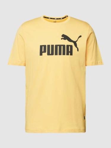 PUMA PERFORMANCE T-Shirt mit Label-Print in Dunkelgelb, Größe S