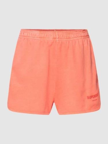 Superdry Sports Shorts mit Label-Print in Orange, Größe M