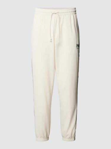 PUMA PERFORMANCE Sweatpants mit Logo-Stitching in Offwhite, Größe M