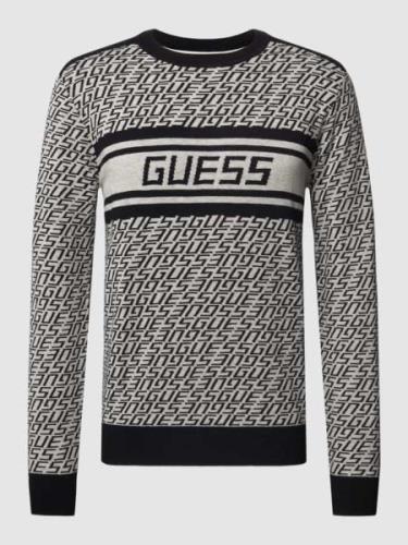 Guess Strickpullover mit Allover-Label-Muster Modell 'PALMER' in Black...