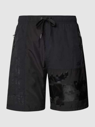 Lacoste Shorts mit Label-Print - LACOSTE Minecraft in Black, Größe L