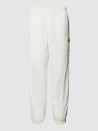 Lacoste Regular Fit Sweatpants mit Logo-Badge in Offwhite, Größe S