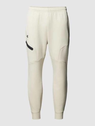 Under Armour Sweatpants mit merzerisiertem Baumwoll-Anteil in Offwhite...