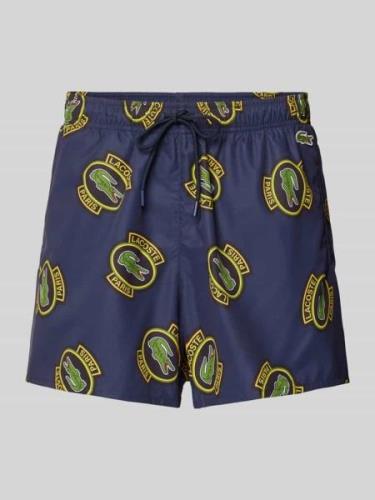 Lacoste Shorts mit Allover-Muster in Dunkelblau, Größe S