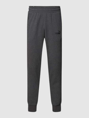 PUMA PERFORMANCE Sweatpants mit Label-Print in Anthrazit, Größe XL