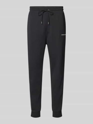 Michael Kors Sweatpants mit Label-Print in Black, Größe M