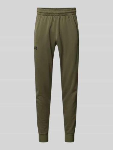 Under Armour Loose Fit Sweatpants mit seitlichen Eingrifftaschen in Ol...