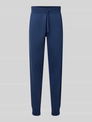 CHAMPION Slim Fit Sweatpants mit elastischen Beinabschlüssen in Marine...