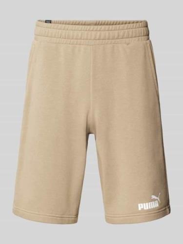 PUMA PERFORMANCE Sweatshorts mit elastischem Bund in Beige, Größe M