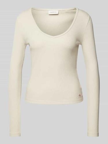 Calvin Klein Jeans Longsleeve mit Label-Patch in Beige, Größe M