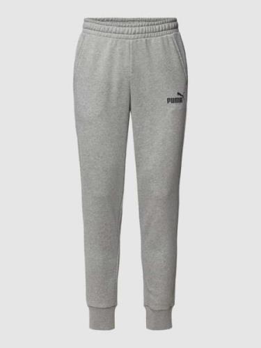 PUMA PERFORMANCE Sweatpants mit Label-Print in Mittelgrau, Größe M