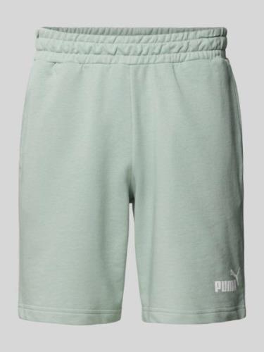 PUMA PERFORMANCE Regular Fit Sweatshorts mit Label-Print in Lind, Größ...