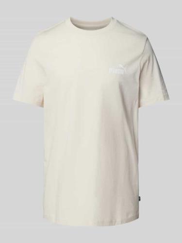 PUMA PERFORMANCE T-Shirt mit Label-Print in Offwhite, Größe XL