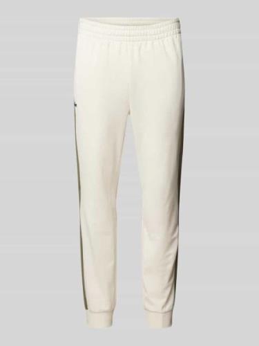 Lacoste Slim Fit Sweatpants mit elastischem Bund in Offwhite, Größe L