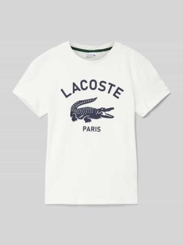 Lacoste T-Shirt mit Label-Print in Offwhite, Größe 140