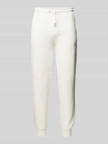 Calvin Klein Jeans Sweatpants mit Label-Stitching in Offwhite, Größe L