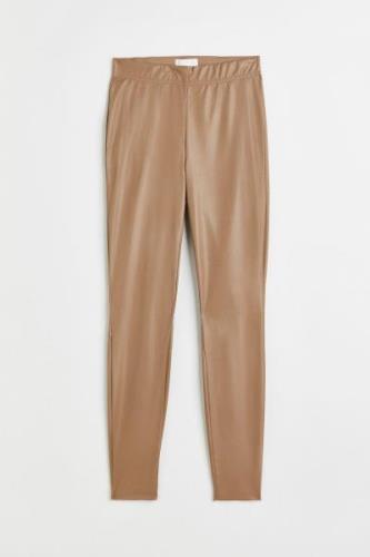 H&M Leggings mit hohem Bund Dunkelbeige in Größe 40. Farbe: Dark beige