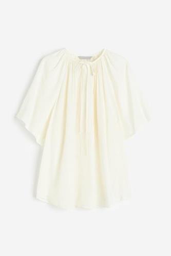 H&M Bluse in Oversize-Passform Cremefarben, Blusen Größe M. Farbe: Cre...