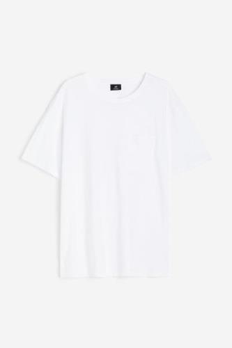 H&M T-Shirt mit Tasche Regular Fit Weiß in Größe S. Farbe: White