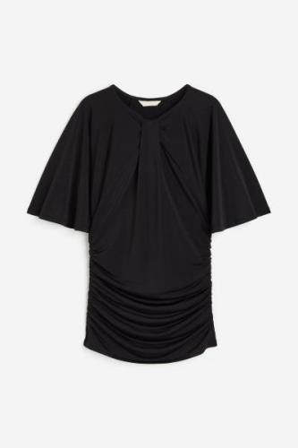 H&M Shirt mit Twist-Detail Schwarz, T-Shirt in Größe XS. Farbe: Black
