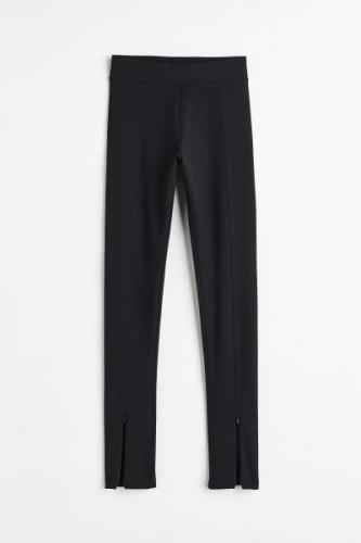 H&M Leggings mit Zipper Schwarz in Größe XS. Farbe: Black
