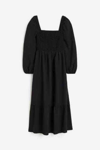 H&M Gesmoktes Crêpe-Kleid Schwarz, Alltagskleider in Größe XXS. Farbe:...