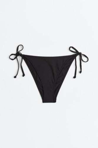 H&M Tie-Tanga Bikinihose Schwarz, Bikini-Unterteil in Größe 44. Farbe:...