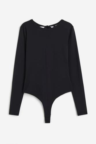 H&M Tangabody mit freiem Rücken Schwarz, Bodys in Größe L. Farbe: Blac...