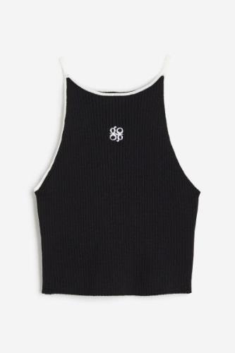 H&M Besticktes Tanktop aus Rippstrick Schwarz, Westen in Größe S. Farb...