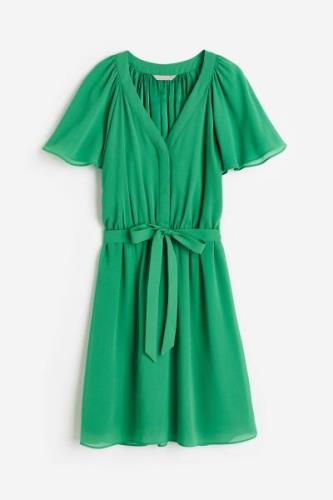 H&M Chiffonkleid mit V-Ausschnitt Grün, Alltagskleider in Größe M. Far...