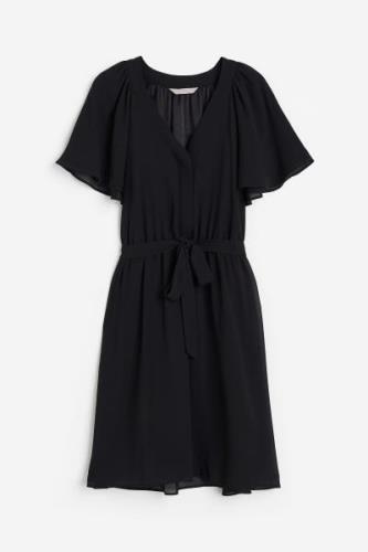 H&M Chiffonkleid mit V-Ausschnitt Schwarz, Alltagskleider in Größe S. ...