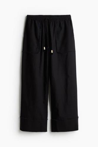 H&M Weite Hose aus Leinenmix Schwarz, Chinohosen in Größe M. Farbe: Bl...