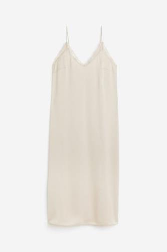 H&M Slipkleid mit Spitze Hellbeige, Alltagskleider in Größe XS. Farbe:...