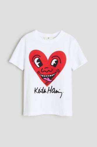 H&M T-Shirt mit Print Weiß/Keith Haring, T-Shirts & Tops in Größe 158/...