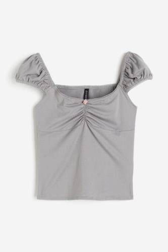 H&M Shirt mit Picot-Besätzen und Puffärmeln Grau, T-Shirt in Größe L. ...