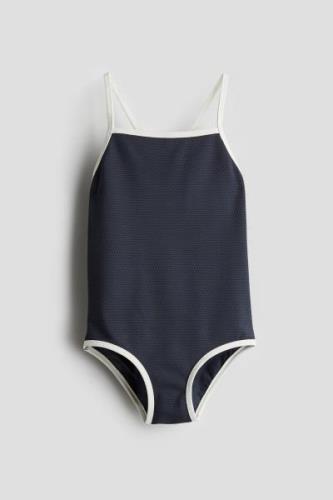 H&M Badeanzug mit Strukturmuster Marineblau in Größe 92. Farbe: Navy b...