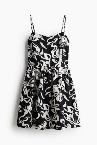 H&M Baumwollkleid mit ausgestelltem Rock Schwarz/Geblümt, Alltagskleid...