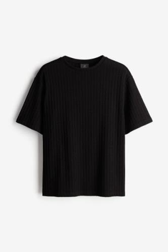 H&M T-Shirt in Loose Fit Schwarz Größe S. Farbe: Black