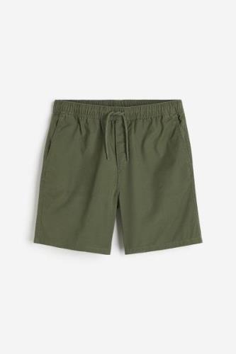 H&M Baumwollshorts Regular Fit Khakigrün in Größe XS. Farbe: Khaki gre...