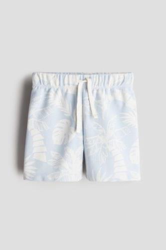 H&M Sweatshorts mit Print Hellblau/Gemustert in Größe 92. Farbe: Light...