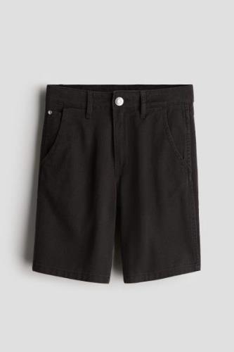 H&M Carpenter-Shorts Schwarz in Größe 134. Farbe: Black