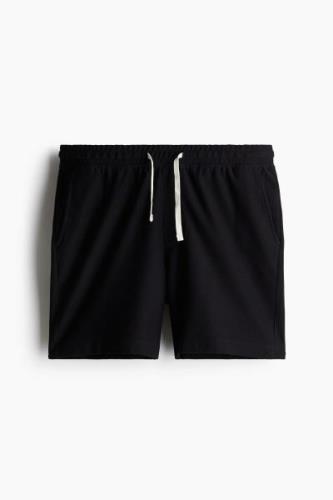 H&M Pikeeshorts in Regular Fit Größe XS. Farbe: Black