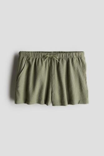 H&M Schlupfshorts Khakigrün in Größe 152. Farbe: Khaki green