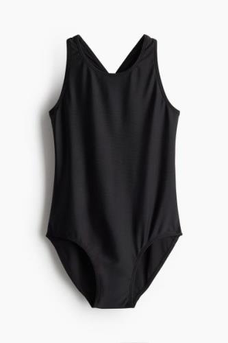 H&M Sportbadeanzug Schwarz in Größe 104. Farbe: Black