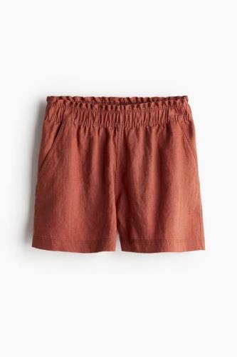 H&M Leinenshorts Rostbraun in Größe XS. Farbe: Rust brown