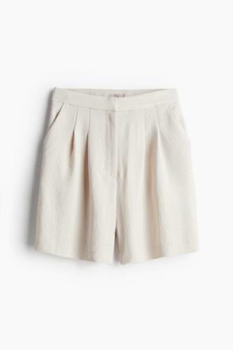 H&M Knielange Shorts Hellbeige in Größe 32. Farbe: Light beige