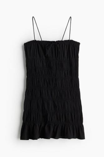 H&M Gesmoktes Bodycon-Kleid Schwarz, Alltagskleider in Größe L. Farbe:...