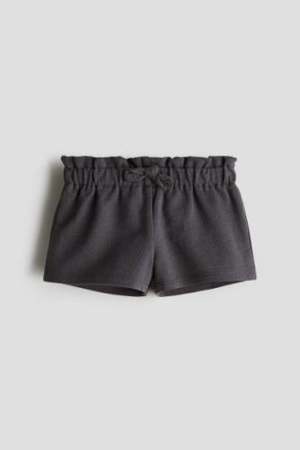 H&M Sweatshorts in Größe 98. Farbe: Dark grey