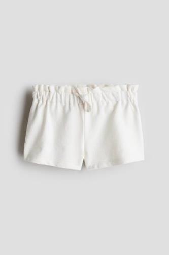 H&M Sweatshorts Weiß in Größe 104. Farbe: White