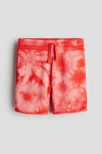 H&M Sweatshorts mit Print Knallrot/Batikmuster in Größe 170. Farbe: Br...